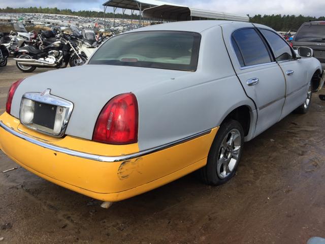 1LNHM82W3YY883561 - 2000 LINCOLN TOWN CAR S YELLOW photo 4