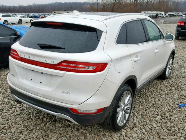 5LMCJ3C94HUL21221 - 2017 LINCOLN MKC RESERV WHITE photo 4