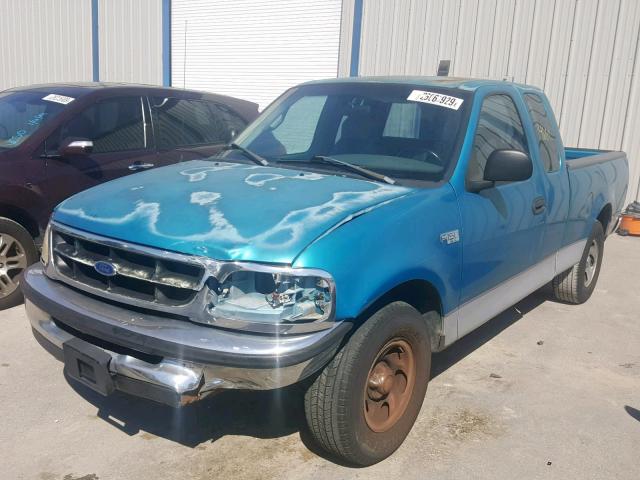 1FTZX1727WNA62023 - 1998 FORD F150 BLUE photo 2