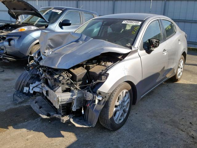 3MYDLBZV5GY127878 - 2016 TOYOTA SCION IA SILVER photo 2