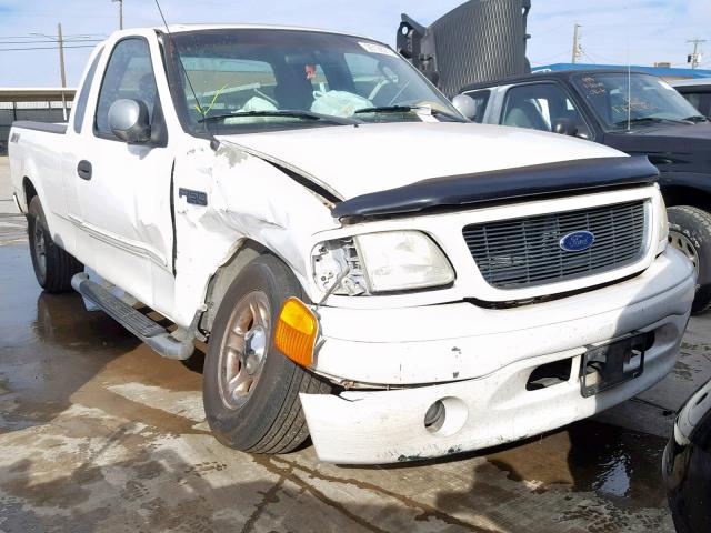 2FTRX172X4CA14373 - 2004 FORD F-150 HERI WHITE photo 1