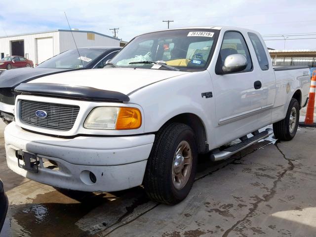 2FTRX172X4CA14373 - 2004 FORD F-150 HERI WHITE photo 2