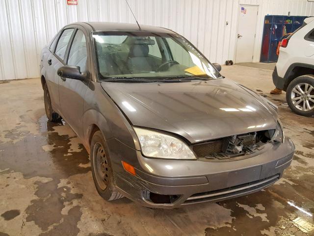 1FAFP34N65W112034 - 2005 FORD FOCUS ZX4 GRAY photo 1