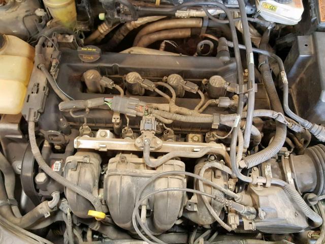 1FAFP34N65W112034 - 2005 FORD FOCUS ZX4 GRAY photo 7