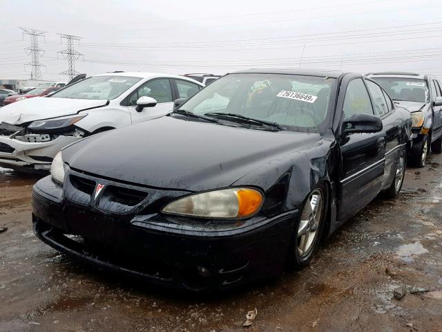 1G2NW52E51C225786 - 2001 PONTIAC GRAND AM G BLACK photo 2