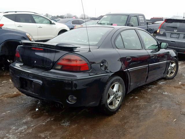 1G2NW52E51C225786 - 2001 PONTIAC GRAND AM G BLACK photo 4