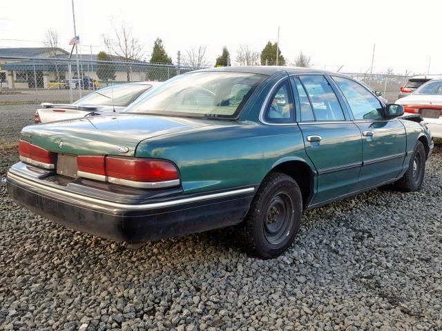 2FALP71WXVX150782 - 1997 FORD CROWN VICT GREEN photo 4