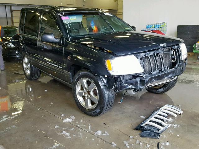 1J4GW48J44C336587 - 2004 JEEP GRAND CHER GRAY photo 1