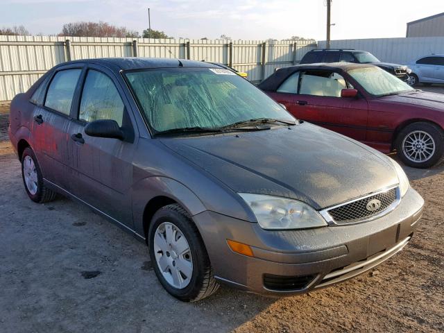 1FAFP34NX7W229263 - 2007 FORD FOCUS ZX4 GRAY photo 1