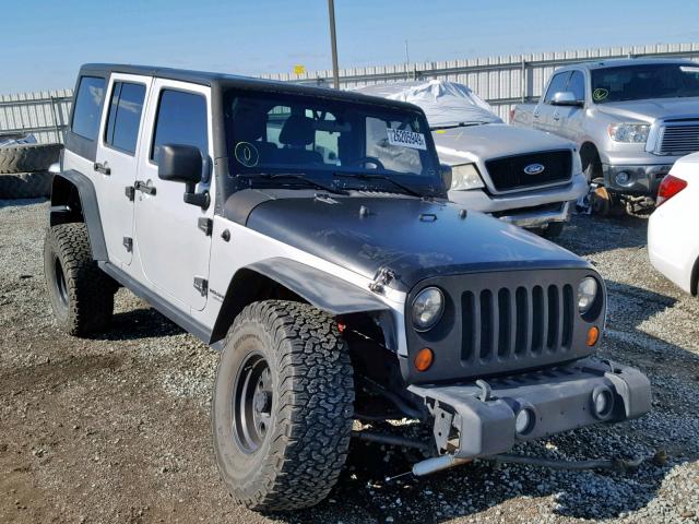 1C4BJWDG9CL119653 - 2012 JEEP WRANGLER U SILVER photo 1