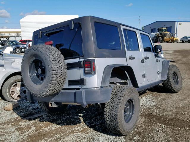 1C4BJWDG9CL119653 - 2012 JEEP WRANGLER U SILVER photo 4