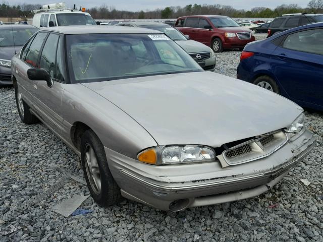 1G2HX52K1VH243761 - 1997 PONTIAC BONNEVILLE TAN photo 1