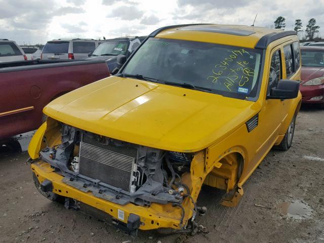 1D4PT6GX5AW174093 - 2010 DODGE NITRO DETO YELLOW photo 2