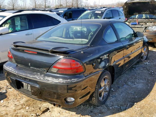 1G2NW12E6YM831935 - 2000 PONTIAC GRAND AM G BLACK photo 4