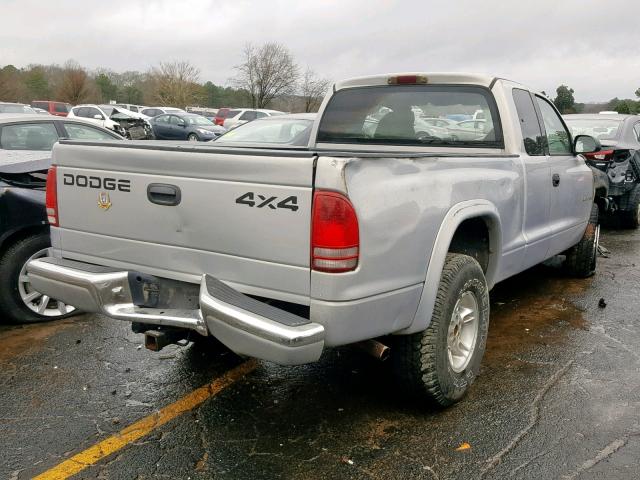 1B7GG22YXXS249719 - 1999 DODGE DAKOTA BLUE photo 4