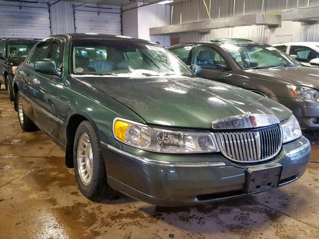 1LNHM81W6XY714554 - 1999 LINCOLN TOWN CAR E GREEN photo 1