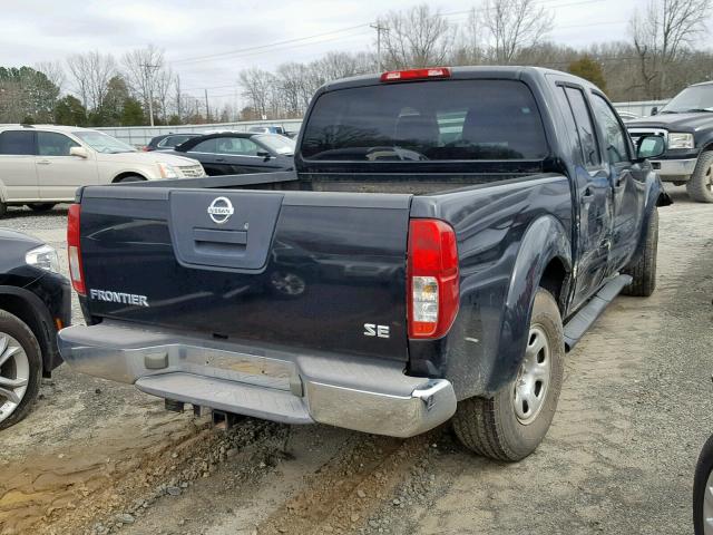 1N6AD07U26C411955 - 2006 NISSAN FRONTIER C BLACK photo 4