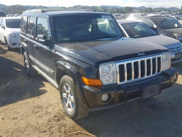 1J8HG58206C170795 - 2006 JEEP COMMANDER BLACK photo 1
