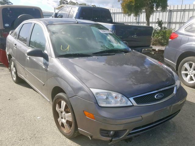 1FAHP34N47W306590 - 2007 FORD FOCUS ZX4 GRAY photo 1