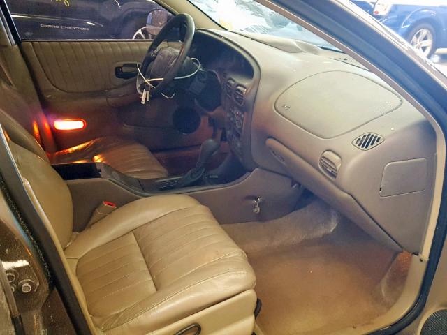 1G2WR5216XF314167 - 1999 PONTIAC GRAND PRIX BROWN photo 5