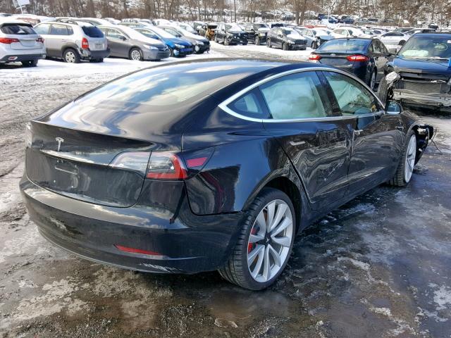 5YJ3E1EB9JF082523 - 2018 TESLA MODEL 3 BLACK photo 4