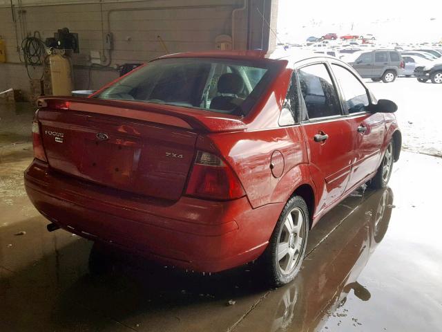 1FAFP34N95W132469 - 2005 FORD FOCUS ZX4 RED photo 4
