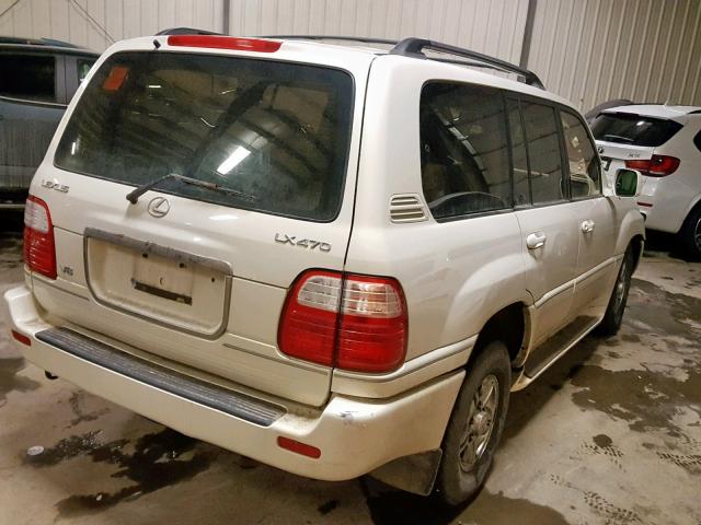 JT6HT00W1X0062782 - 1999 LEXUS LX 470 WHITE photo 4