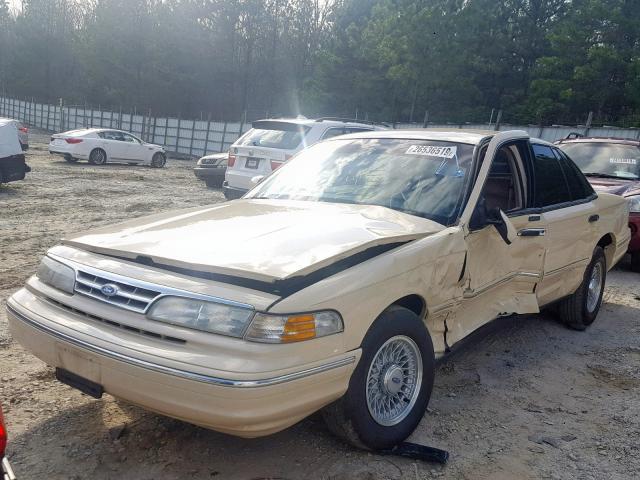 2FALP74W7VX188577 - 1997 FORD CROWN VICT YELLOW photo 2