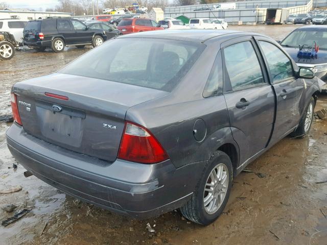 1FAFP34N56W227483 - 2006 FORD FOCUS ZX4 GRAY photo 4
