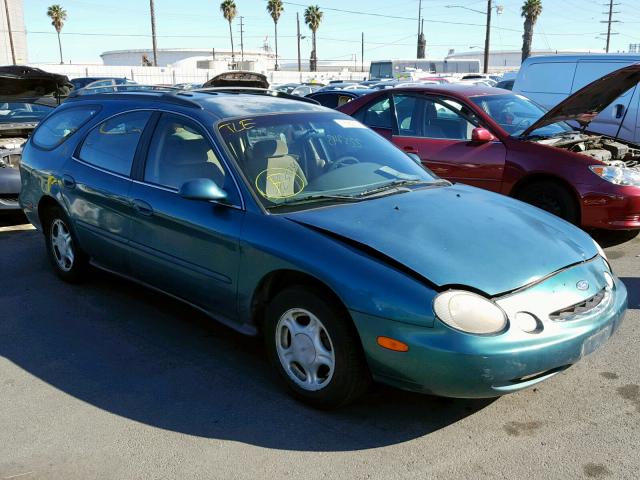 1FALP57U3VA304140 - 1997 FORD TAURUS GL GREEN photo 1