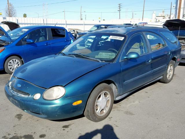 1FALP57U3VA304140 - 1997 FORD TAURUS GL GREEN photo 2