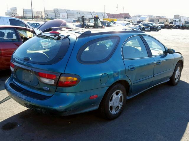 1FALP57U3VA304140 - 1997 FORD TAURUS GL GREEN photo 4