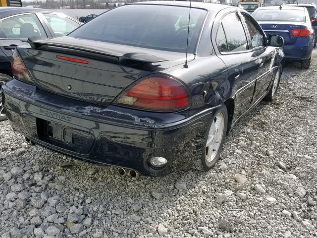 1G2NW52E9XM808641 - 1999 PONTIAC GRAND AM G BLACK photo 4