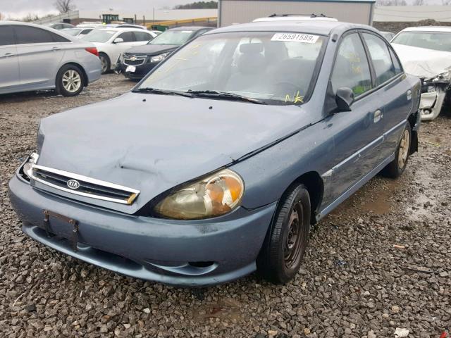 KNADC123X16043990 - 2001 KIA RIO BLUE photo 2