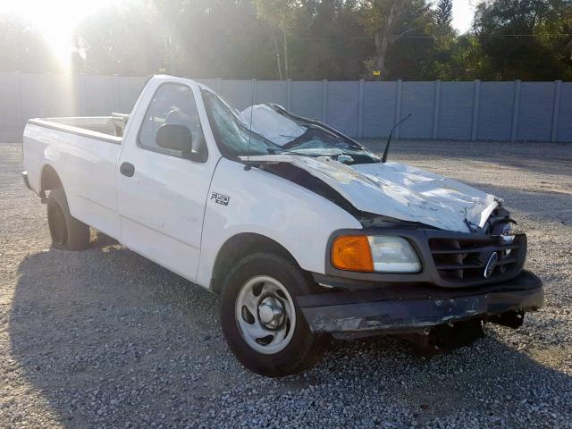 2FTRF17204CA94320 - 2004 FORD F-150 HERI WHITE photo 1