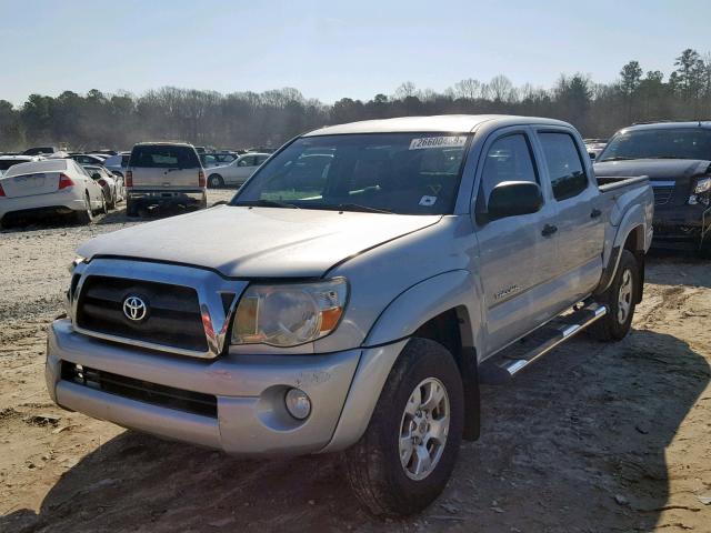 3TMJU4GN6BM122119 - 2011 TOYOTA TACOMA DOU SILVER photo 2