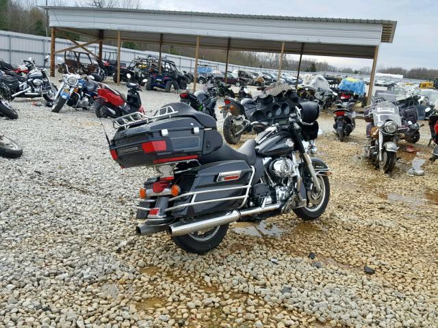 1HD1FC4107Y675364 - 2007 HARLEY-DAVIDSON FLHTCUI BLACK photo 4