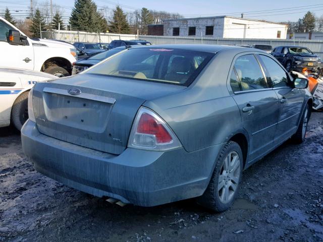 3FAFP08Z66R153263 - 2006 FORD FUSION SEL BLUE photo 4