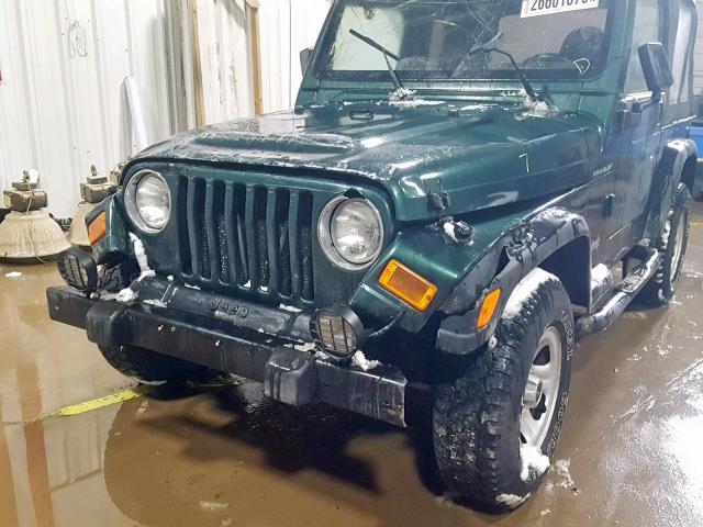 1J4FA29P7YP773645 - 2000 JEEP WRANGLER / GREEN photo 9