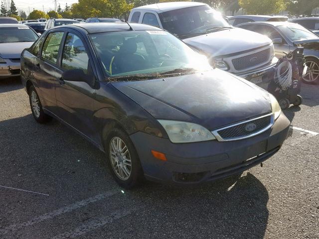 1FAFP34N55W250664 - 2005 FORD FOCUS ZX4 BLACK photo 1