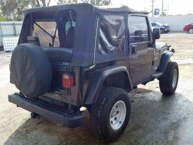 1J4FY19S4XP404895 - 1999 JEEP WRANGLER / BLACK photo 4