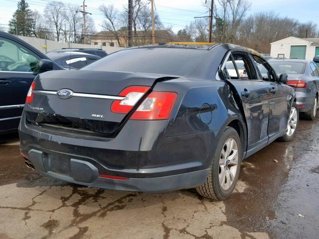 1FAHP2EW5AG131592 - 2010 FORD TAURUS SEL BLACK photo 4