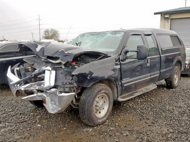 1FTSX30F0XEE69256 - 1999 FORD F350 SRW S BLACK photo 2