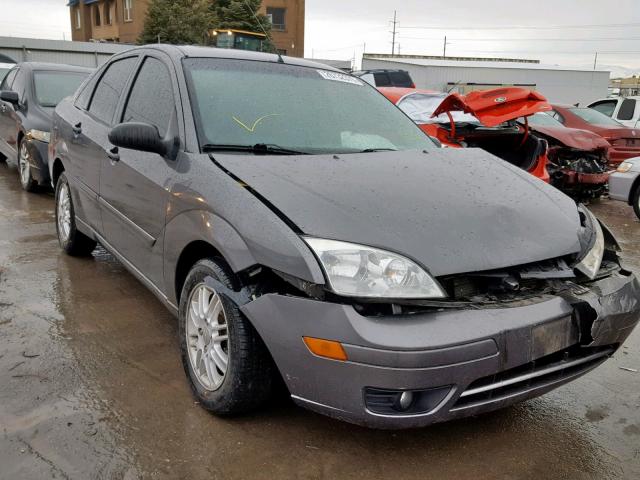 1FAHP34N27W361006 - 2007 FORD FOCUS ZX4 GRAY photo 1