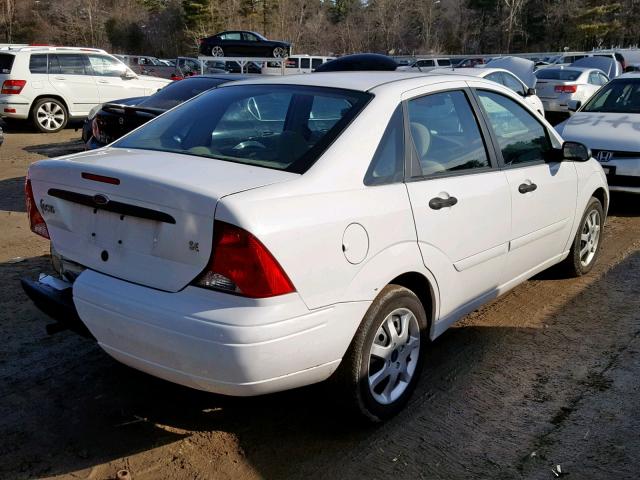 1FAFP34Z04W129851 - 2004 FORD FOCUS SE C WHITE photo 4