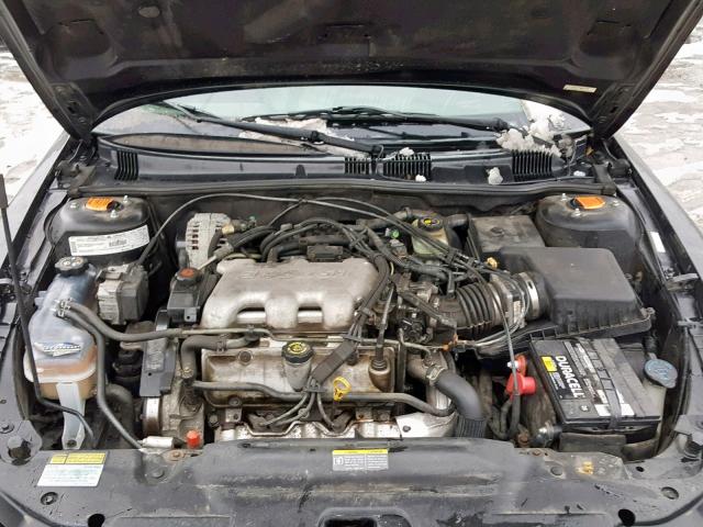 1G2NE52E2XM709775 - 1999 PONTIAC GRAND AM S BLACK photo 7