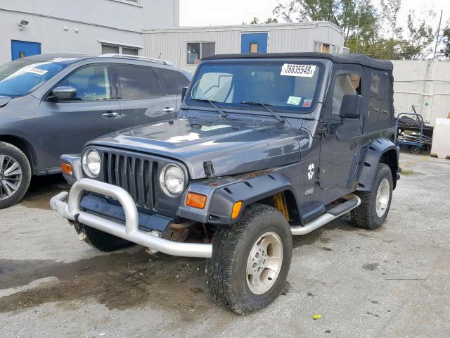 1J4FA49SX1P312722 - 2001 JEEP WRANGLER / GRAY photo 2