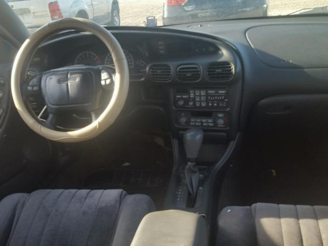 1G2WP52K4XF269888 - 1999 PONTIAC GRAND PRIX WHITE photo 9