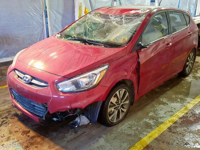 KMHCT5AEXHU305095 - 2017 HYUNDAI ACCENT SE RED photo 2