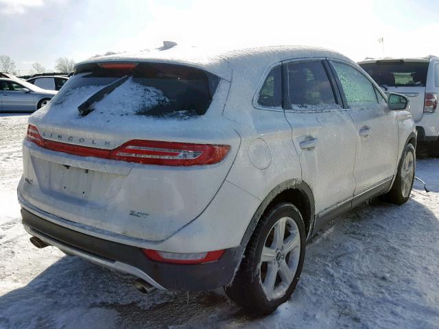 5LMCJ1C92HUL36546 - 2017 LINCOLN MKC PREMIE WHITE photo 4